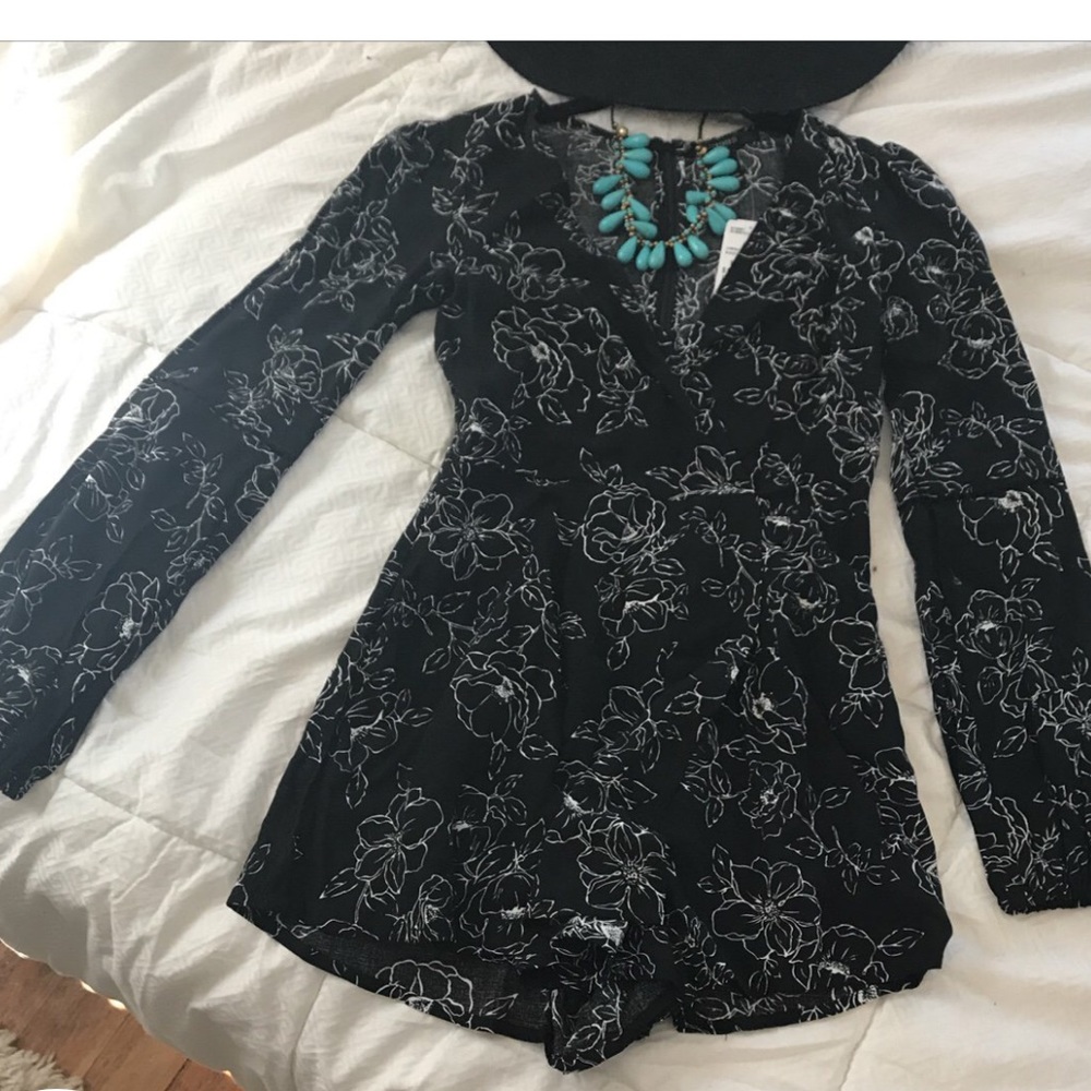 Brand new black and white floral romper
